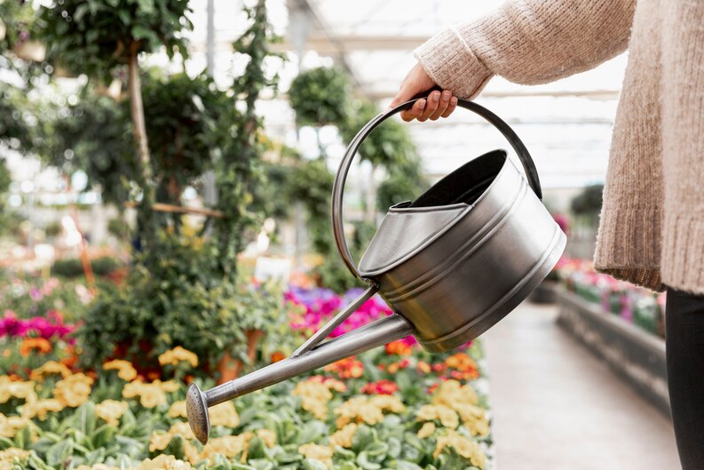 metal watering can