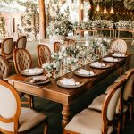 dining tables with food in wedding venue
